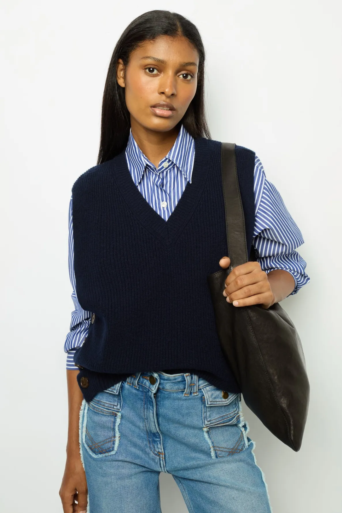 sleeveless_wool_ribbed_vn_0.webp Fashion Sleeveless wool ribbed V-neck sweater - LUCCIA Knitwear