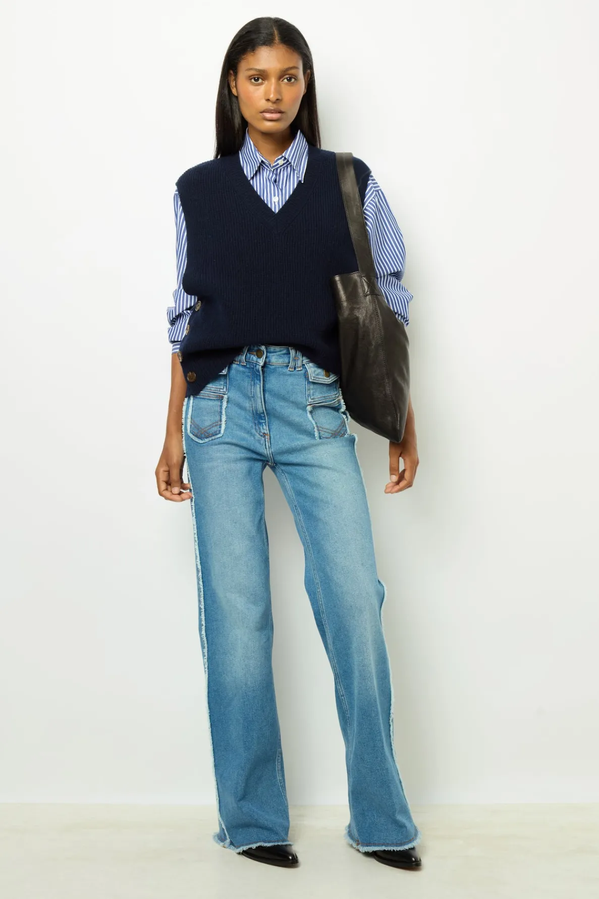 sleeveless_wool_ribbed_vn_1.webp Fashion Sleeveless wool ribbed V-neck sweater - LUCCIA Knitwear