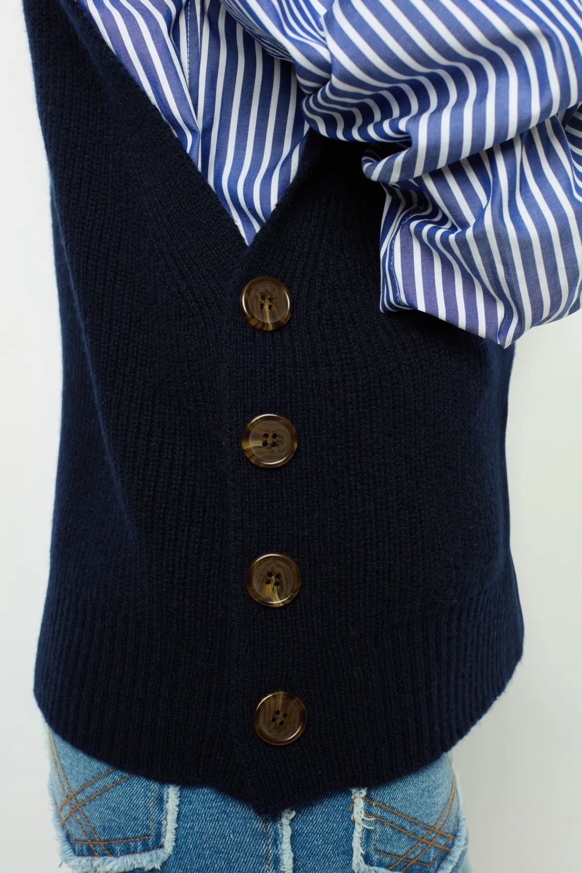 sleeveless_wool_ribbed_vn_2.webp Fashion Sleeveless wool ribbed V-neck sweater - LUCCIA Knitwear