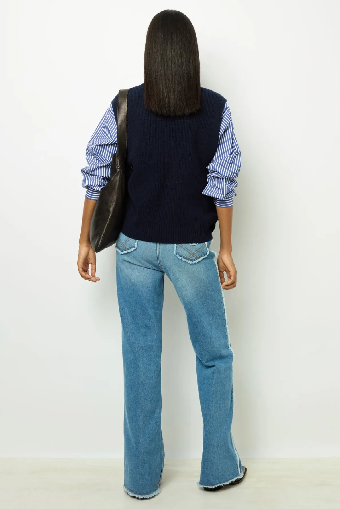 sleeveless_wool_ribbed_vn_3.webp Fashion Sleeveless wool ribbed V-neck sweater - LUCCIA Knitwear